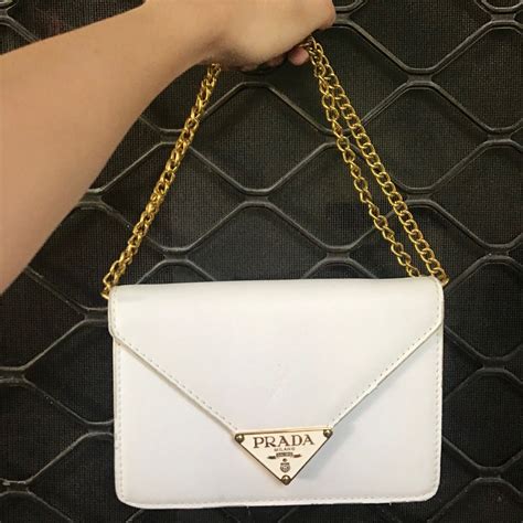 prada sling bag white